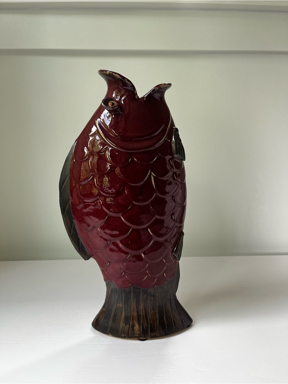 Glossy Burgundy Ceramic Fish Figurine with Dark Accents
